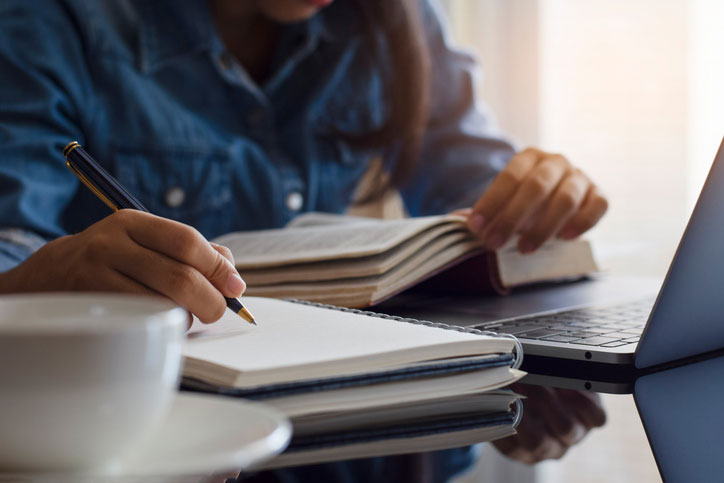 female student hard at work