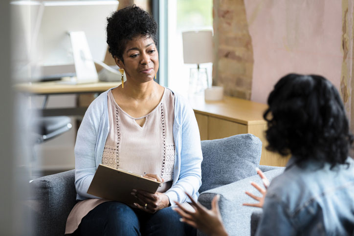 social worker focusing on patient