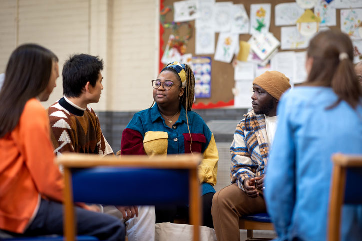 group nonprofit volunteers in meeting