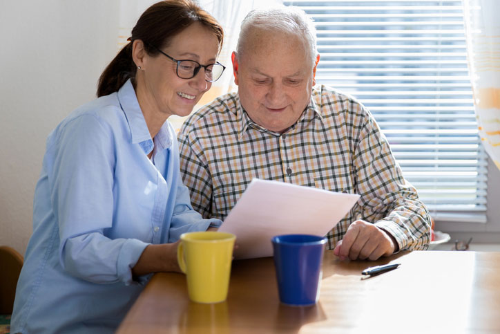 elderly talking with social worker