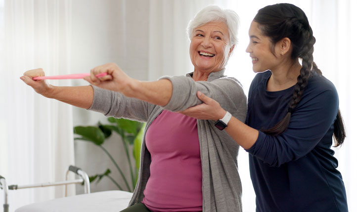 elderly doing exercises with a little help