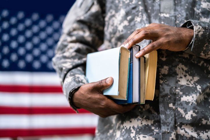 young military student with books