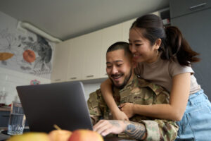 young couple looking at computer